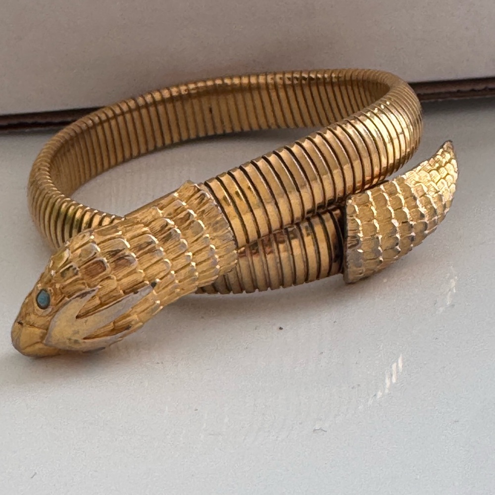 Vintage gold tone snake wrap bracelet omega link